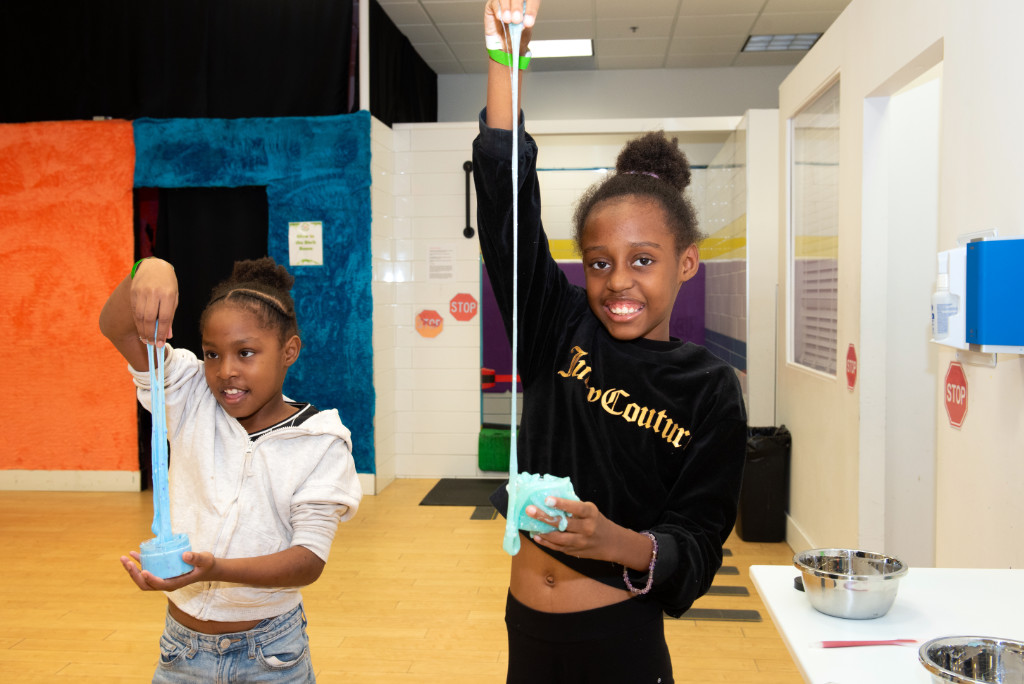 Kids explore textures, glowing slime, and foam pits for sensory fun.
