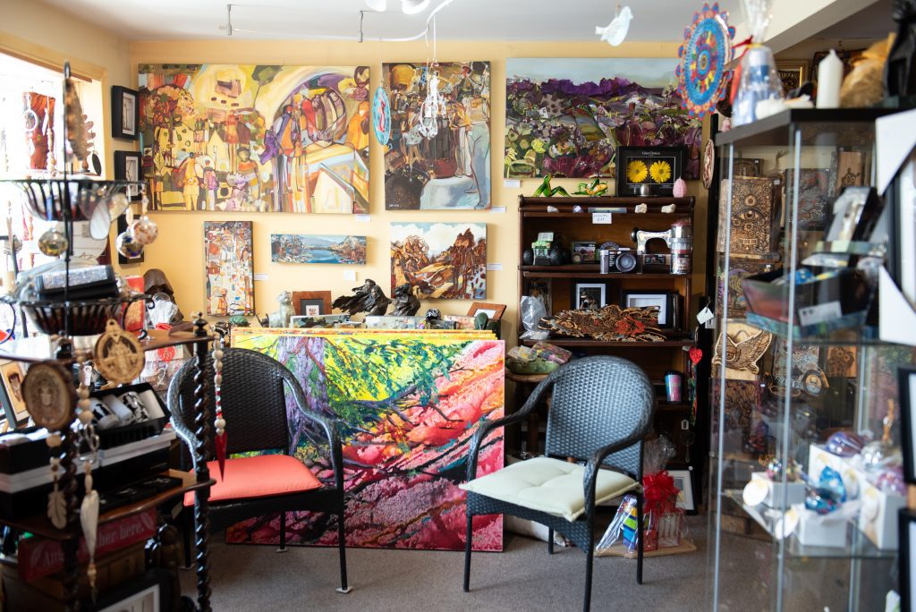 Art on the wall by contemporary artist Tina Newlove; artwork near the chairs by landscape artist Pat McGoey.